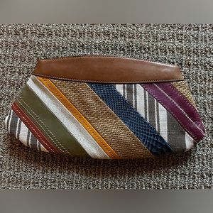 Rare vintage leather striped clutch.